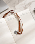 A5 journal notebook with engraved metal bookmark charm
