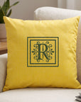 Close-up of embroidered name on personalised patterned cushion cover