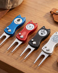Close-up of engraved name on golf divot tool and magnetic ball marker