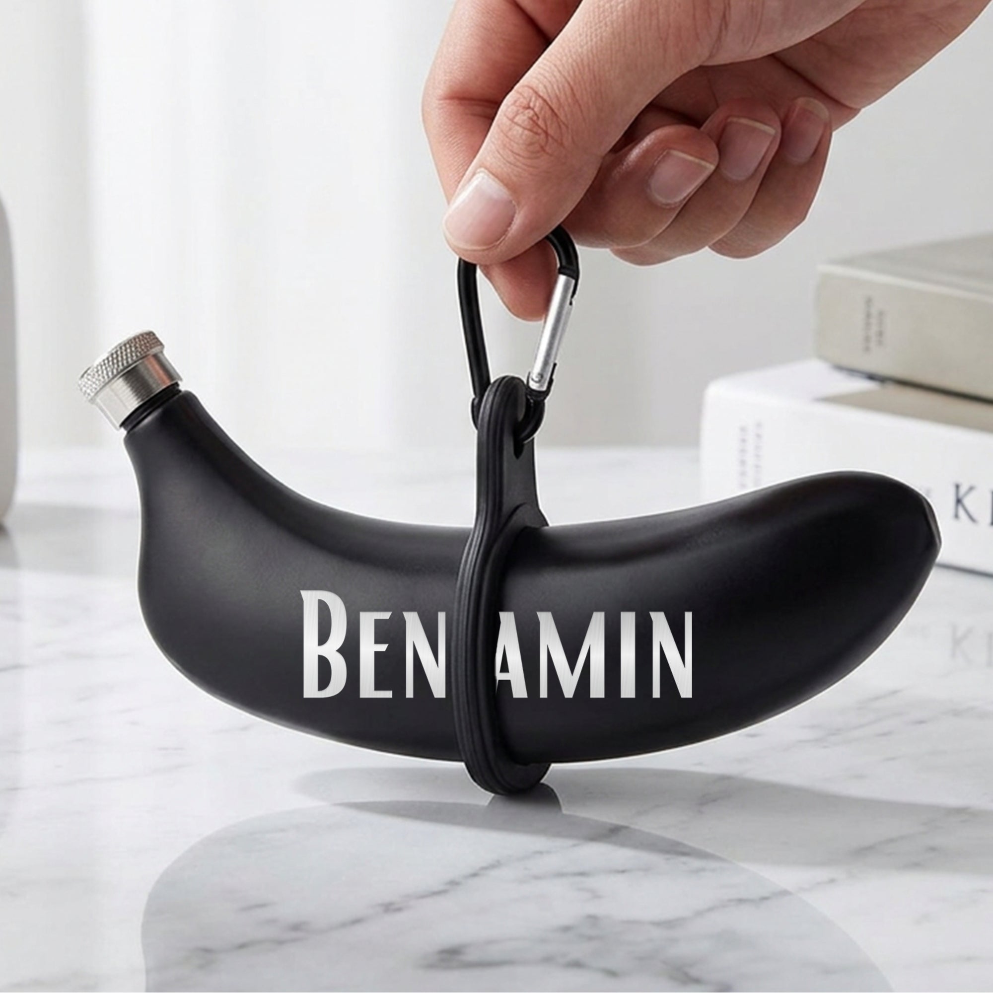 Close-up of engraved name on personalised banana hip flask
