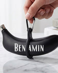 Close-up of engraved name on personalised banana hip flask