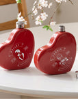 Close-up of engraved name on personalised heart hip flask