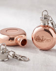 Close-up of laser engraved name on personalised mini round hip flask keyring