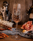 Engraved wedding cake knife and server with champagne flutes
