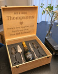 Engraved wooden gift box with cake knife server and champagne flutes