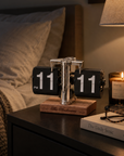 Auto-flip desk clock in white with beech base and black with walnut base