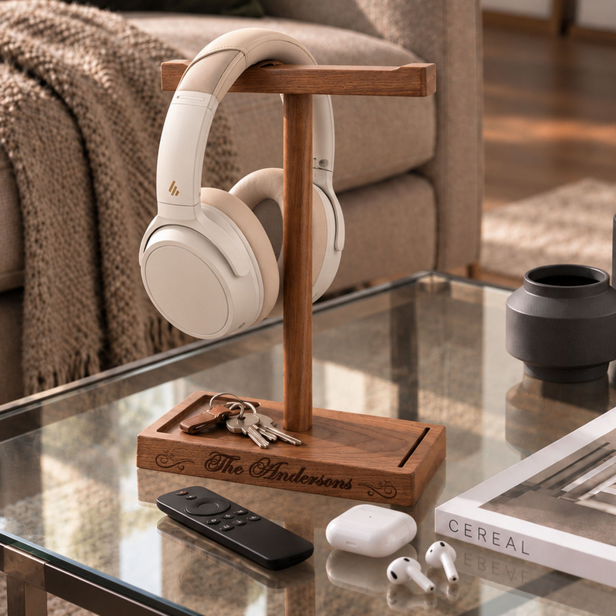 Personalised walnut headphone stand with headphones and keys in the storage tray