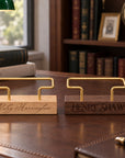 Beech and walnut business card holders with names laser engraved into the base